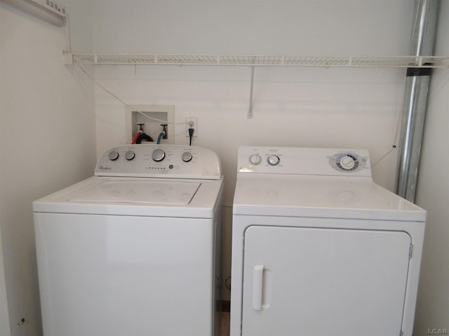 1303 Carriage Dr, Tecumseh, MI 49286 - washroom with washer and dryer