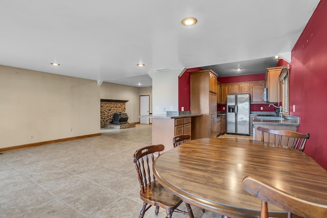 186 Goldsmith Dr, Clarklake, MI 49234 - dining area with recessed lighting, baseboards, and light tile patterned floors