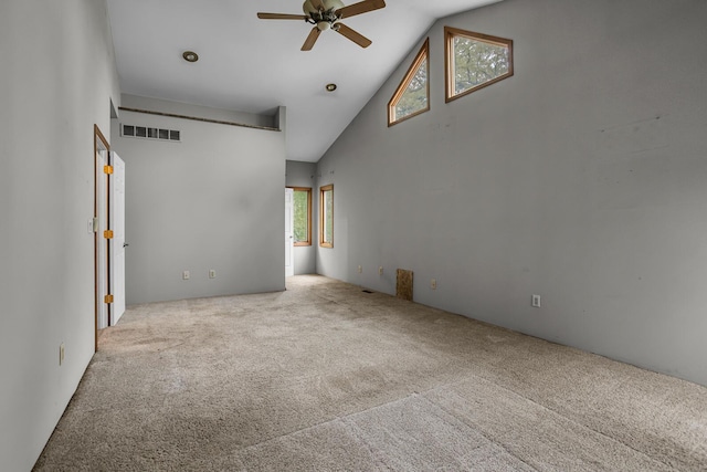 186 Goldsmith Dr, Clarklake, MI 49234 - carpeted spare room with a ceiling fan and high vaulted ceiling