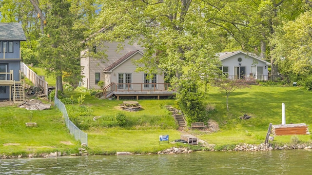 186 Goldsmith Dr, Clarklake, MI 49234 - rear view of property with stairway and a deck with water view