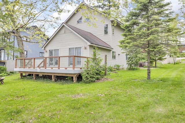186 Goldsmith Dr, Clarklake, MI 49234 - back of house with a deck and a lawn