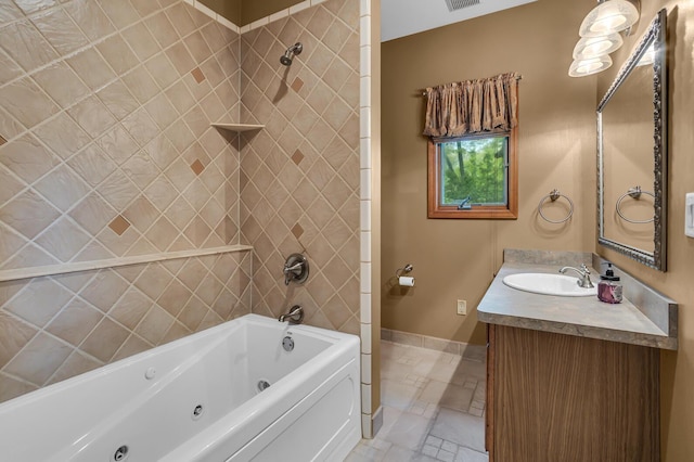 186 Goldsmith Dr, Clarklake, MI 49234 - full bathroom featuring baseboards, vanity, and a combined bath / shower with jetted tub
