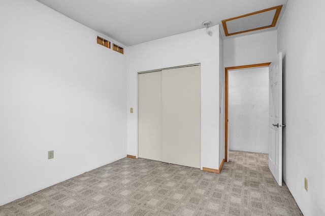 186 Goldsmith Dr, Clarklake, MI 49234 - unfurnished bedroom with a closet and attic access