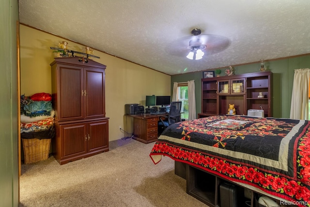 4232 Washburn Rd, Vassar, MI 48768 - bedroom featuring a textured ceiling, light carpet, and ceiling fan