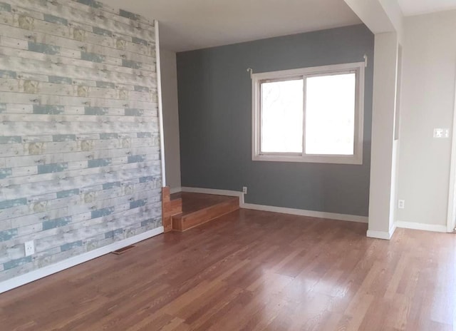 2205 Regina Ave, Lincoln Park, MI 48146 - empty room featuring wood finished floors and baseboards