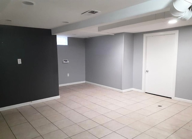 2205 Regina Ave, Lincoln Park, MI 48146 - basement with baseboards and light tile patterned flooring