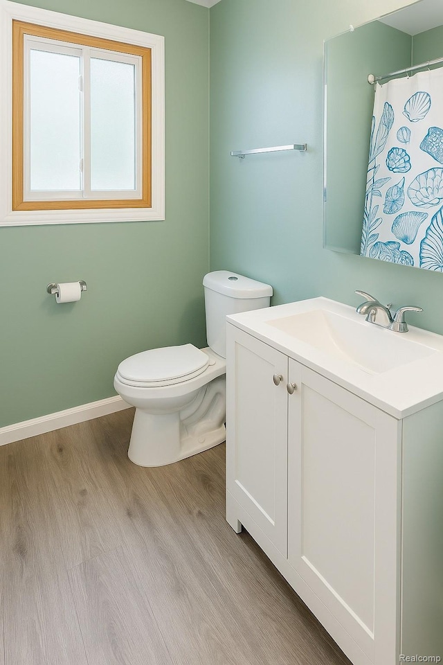 2205 Regina Ave, Lincoln Park, MI 48146 - bathroom with wood finished floors and vanity