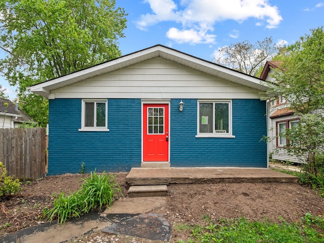 21357 Poinciana St, Southfield, MI 48033 - view of front of house featuring fence and brick siding