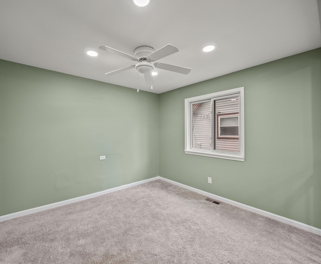 21357 Poinciana St, Southfield, MI 48033 - unfurnished room with a ceiling fan, baseboards, recessed lighting, and carpet