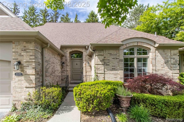 22170 Orchard Way, Beverly Hills, MI 48025 - entrance to property featuring roof with shingles and an attached garage