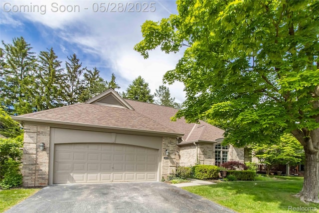 22170 Orchard Way, Beverly Hills, MI 48025 - view of front of house with asphalt driveway, roof with shingles, and stone siding
