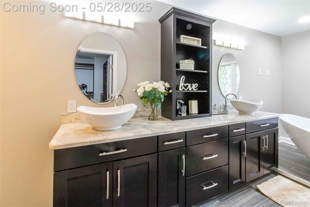 22170 Orchard Way, Beverly Hills, MI 48025 - full bath with double vanity and a freestanding tub