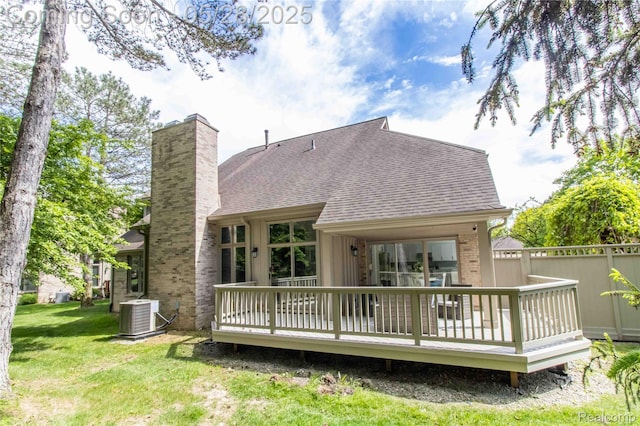 22170 Orchard Way, Beverly Hills, MI 48025 - rear view of house featuring a chimney, a shingled roof, central AC, and a wooden deck