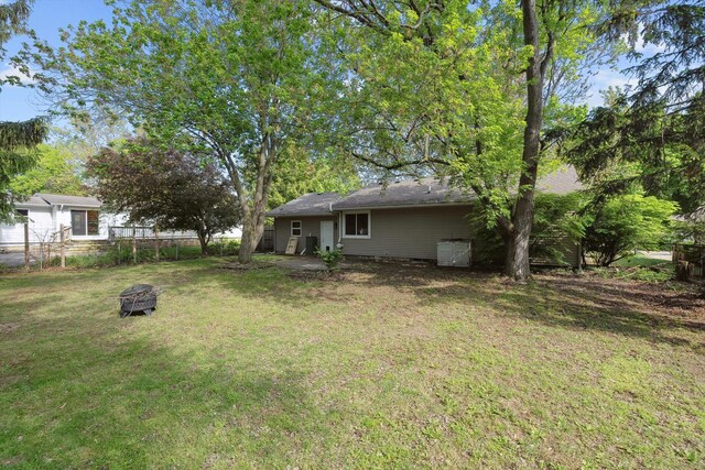 1008 Park St, Tecumseh, MI 49286 - view of yard with an outdoor fire pit