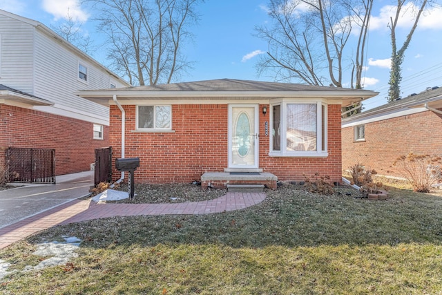 15945 Horger Ave, Allen Park, MI 48101 - bungalow-style home featuring a front lawn and brick siding