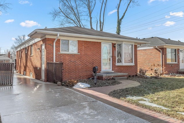 15945 Horger Ave, Allen Park, MI 48101 - view of front of property with brick siding, driveway, and roof with shingles