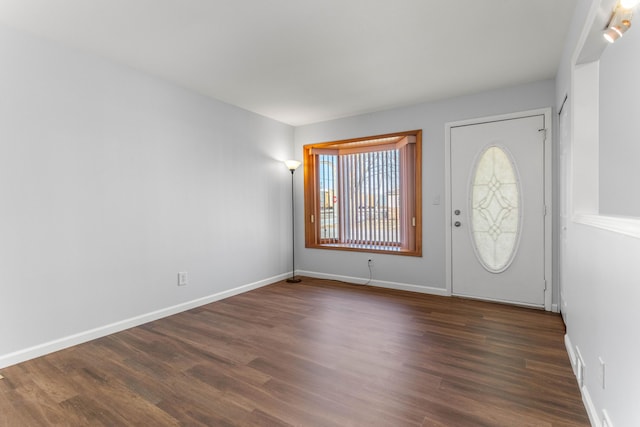 15945 Horger Ave, Allen Park, MI 48101 - foyer entrance featuring dark wood-style flooring and baseboards