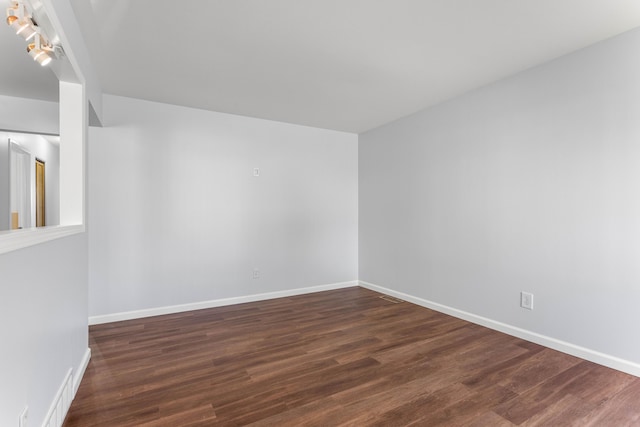 15945 Horger Ave, Allen Park, MI 48101 - spare room with dark wood-style flooring and baseboards