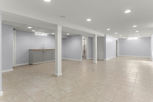 15945 Horger Ave, Allen Park, MI 48101 - finished below grade area with a sink, recessed lighting, baseboards, and light tile patterned floors