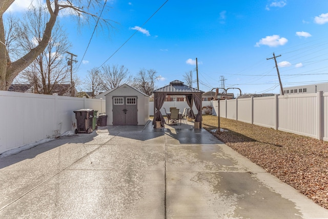 15945 Horger Ave, Allen Park, MI 48101 - view of patio / terrace with a gazebo, a shed, a fenced backyard, and an outdoor structure