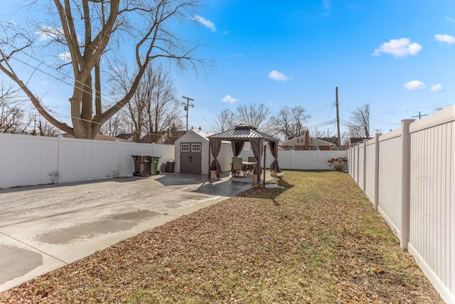 15945 Horger Ave, Allen Park, MI 48101 - fenced backyard with a patio area, a gazebo, a shed, and an outdoor structure