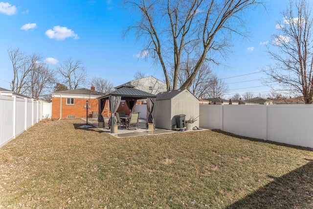 15945 Horger Ave, Allen Park, MI 48101 - rear view of house with a gazebo, a patio area, an outdoor structure, brick siding, and a storage shed
