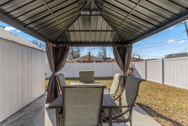 15945 Horger Ave, Allen Park, MI 48101 - view of patio / terrace featuring a gazebo, a fenced backyard, and outdoor dining area