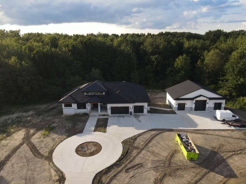 815 N Milford Rd, Milford, MI 48381 - view from above of property with a forest
