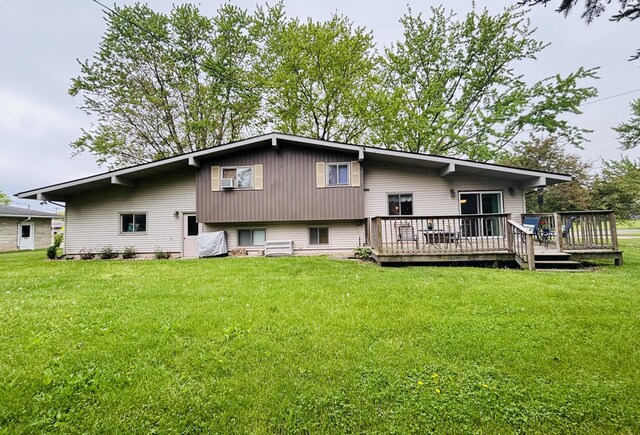 300 Maplecrest Ave, Sturgis, MI 49091 - back of house featuring a wooden deck and a lawn