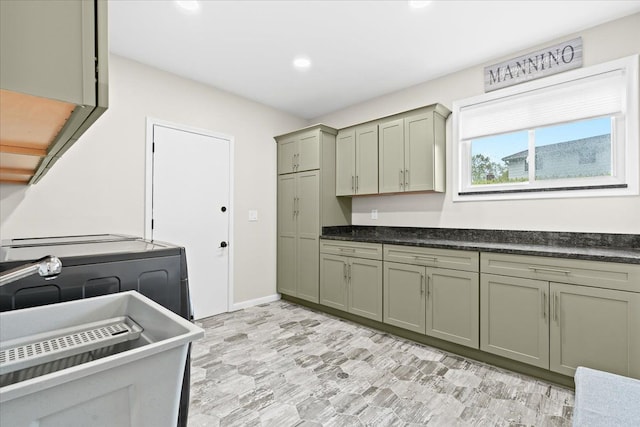 6557 N Twindale, Shelby Twp, MI 48316 - washroom with cabinet space, washer / dryer, and recessed lighting