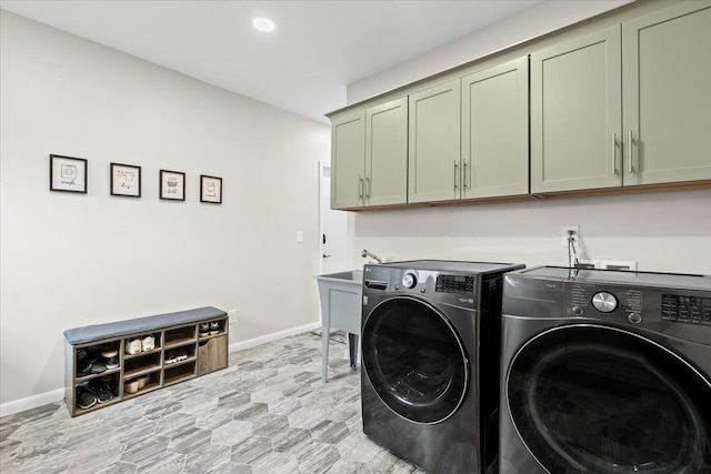 6557 N Twindale, Shelby Twp, MI 48316 - laundry room with cabinet space, washer and clothes dryer, baseboards, and recessed lighting