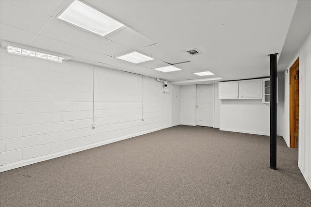6557 N Twindale, Shelby Twp, MI 48316 - finished below grade area with dark carpet and baseboards