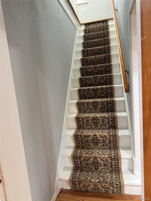 835 W Marr Rd, Howell, MI 48855 - stairs with wood finished floors