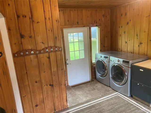835 W Marr Rd, Howell, MI 48855 - laundry room featuring wooden ceiling, separate washer and dryer, and wooden walls