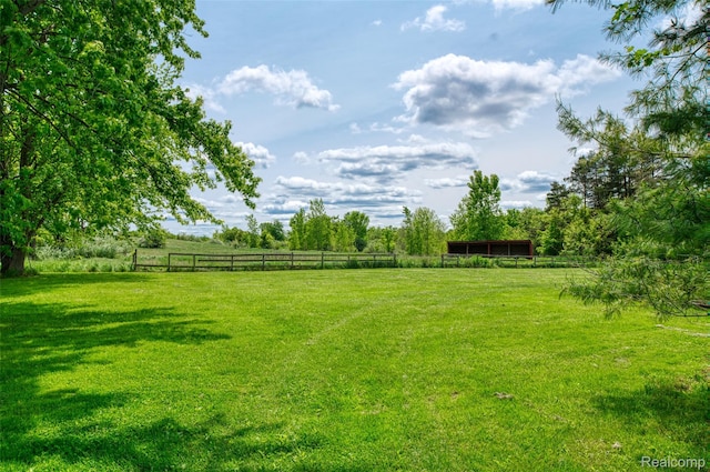 835 W Marr Rd, Howell, MI 48855 - view of yard with a view of countryside and an outbuilding