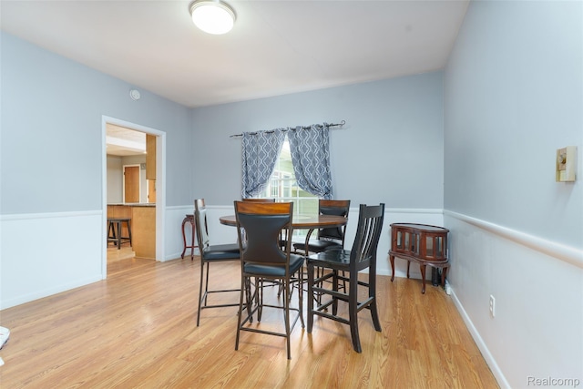 835 W Marr Rd, Howell, MI 48855 - dining area with light wood-style floors and baseboards