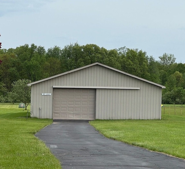 12161 Ladd Rd, Brooklyn, MI 49230 - detached garage with a wooded view