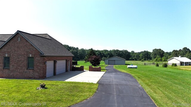 12161 Ladd Rd, Brooklyn, MI 49230 - view of front facade featuring brick siding