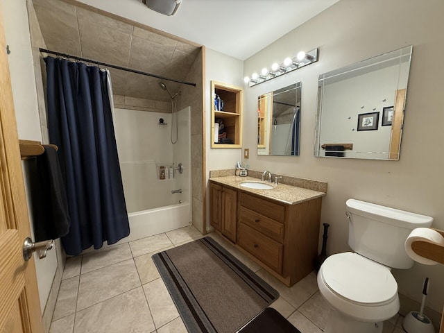 520 N Campbell Rd, Fountain, MI 49410 - full bath featuring toilet, shower / bath combo with shower curtain, vanity, and tile patterned flooring