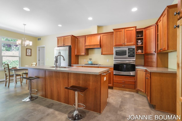 94 Cheyenne Ave, Holland, MI 49424 - kitchen featuring stainless steel appliances, a sink, premium range hood, brown cabinets, and recessed lighting