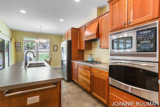 94 Cheyenne Ave, Holland, MI 49424 - kitchen featuring stainless steel appliances, a sink, premium range hood, a chandelier, and brown cabinetry