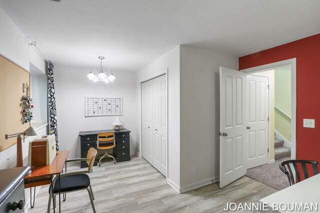94 Cheyenne Ave, Holland, MI 49424 - office space with light wood-type flooring, a chandelier, and baseboards