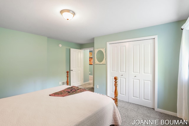 94 Cheyenne Ave, Holland, MI 49424 - bedroom featuring light colored carpet, a closet, and baseboards