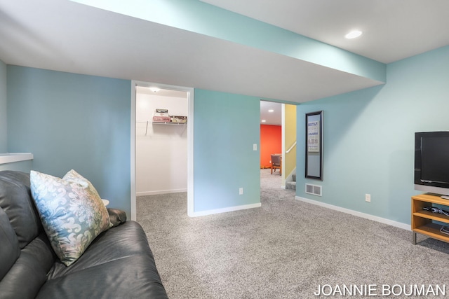 94 Cheyenne Ave, Holland, MI 49424 - carpeted living area with baseboards and recessed lighting