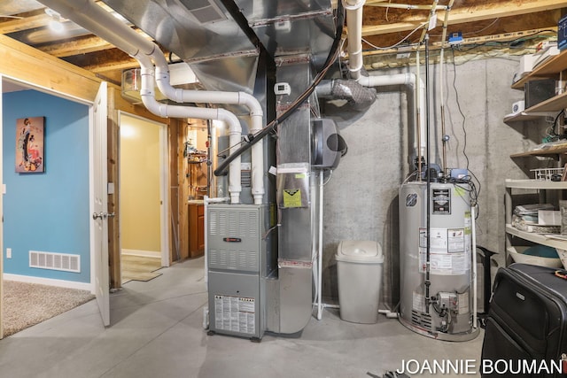94 Cheyenne Ave, Holland, MI 49424 - utility room featuring water heater
