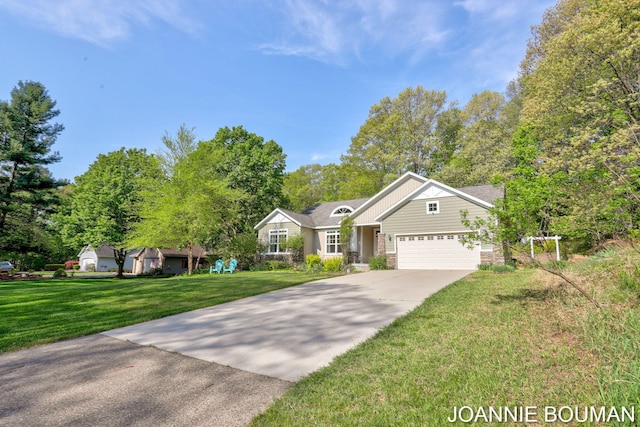 94 Cheyenne Ave, Holland, MI 49424 - single story home with concrete driveway, an attached garage, a front yard, and stone siding