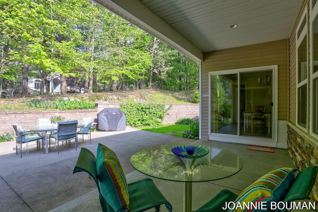 94 Cheyenne Ave, Holland, MI 49424 - view of patio featuring outdoor dining area and area for grilling