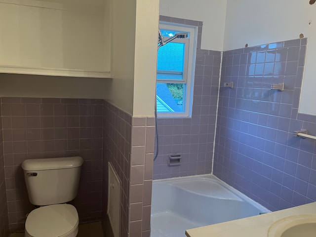 1433 Minnie St, Port Huron, MI 48060 - bathroom with toilet, tile walls, vanity, and a wainscoted wall