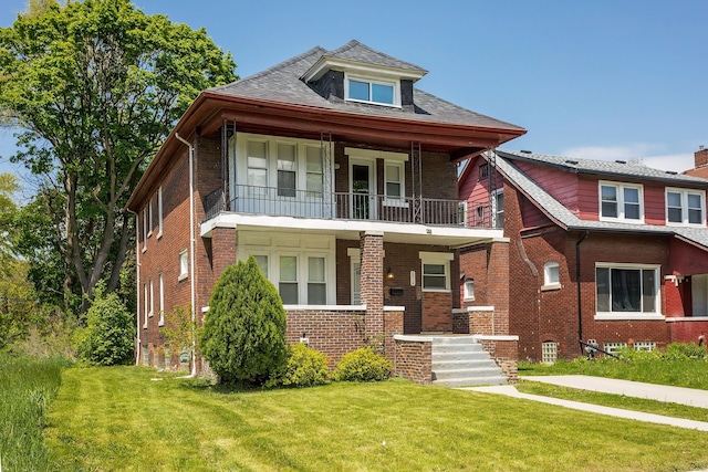 2514 Lothrop St, Detroit, MI 48206 - view of front facade with a balcony, a porch, a front yard, and brick siding