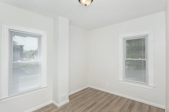 2514 Lothrop St, Detroit, MI 48206 - unfurnished room with light wood-type flooring and baseboards